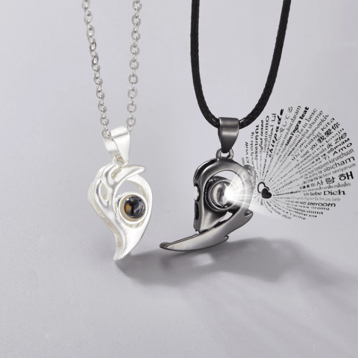 Collar de pareja con corazón magnético de llama de acero inoxidable y titanio - Quierox - Tienda Online