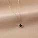 Collar de serie de trébol de cuatro hojas negro y dorado - Quierox - Tienda Online