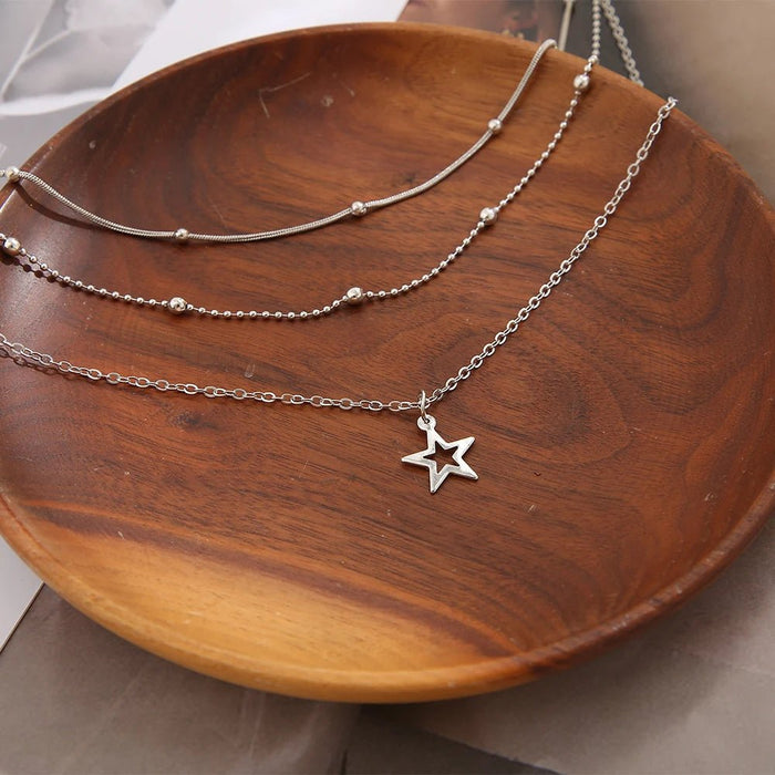 Collar europeo y americano de temperamento sencillo con atmósfera encantadora, estrella y luna - Quierox - Tienda Online