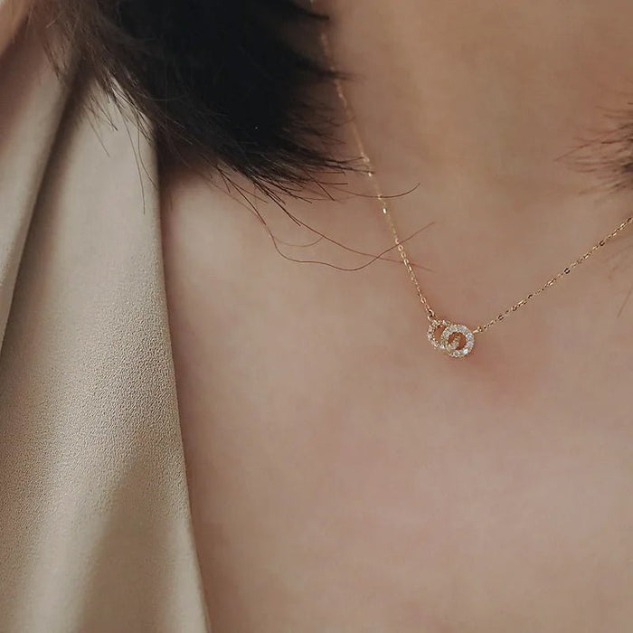 Collar Metiseko de plata de ley 925 con doble cruz y círculos de circonitas cúbicas transparentes - Quierox - Tienda Online