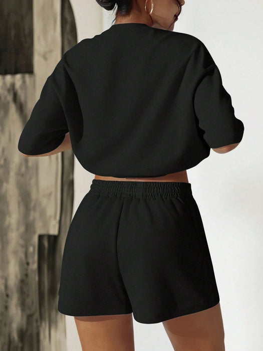 Conjunto de camiseta holgada con gráfico de letras y pantalones cortos de unicolor - Quierox - Tienda Online