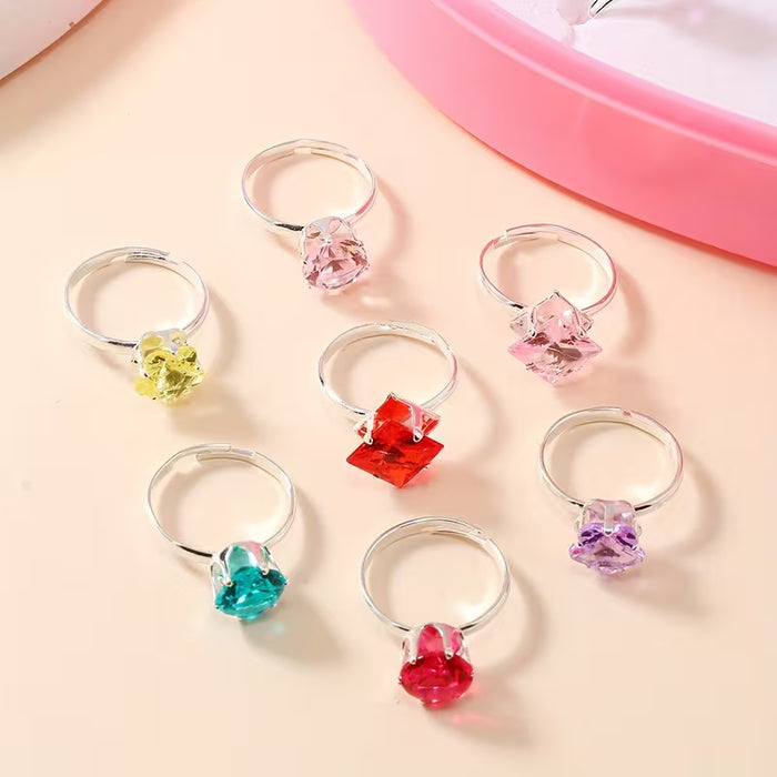 Set de joyería de 5 anillos plateados de imitación con diseños aleatorios