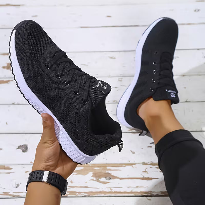 Zapatillas de correr transpirables y ligeras para mujer de caña baja con cierre de cordones