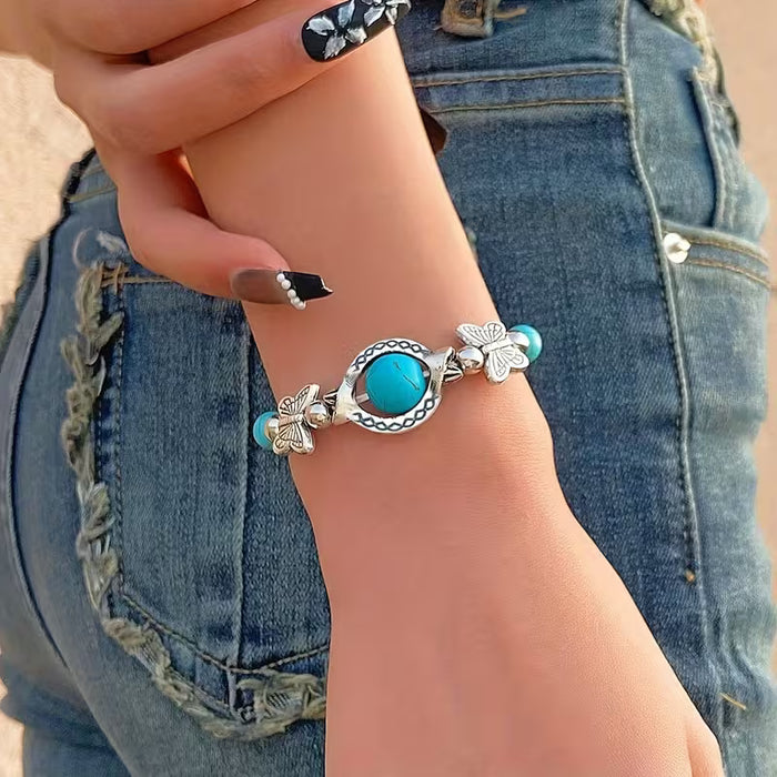 Pulsera turquesa vintage hecha a mano, cuentas de la suerte de mariposa