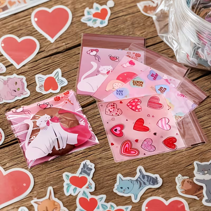 100pcs Bolsas autoadhesivas de plástico rosa de corazón romántico