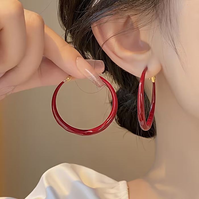 Pendientes de mujer rojo retro y elegante, con hebilla dorada