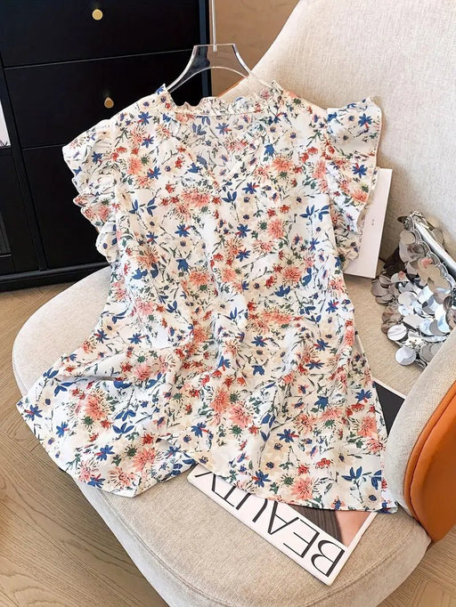 Elegante blusa con cuello en V y estampado floral para mujer. Manga corta, tela no elástica. - Quierox - Tienda Online