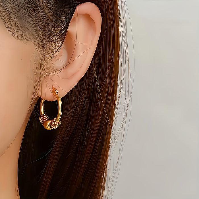 Un par de aretes de acero inoxidable vintage de moda para mujer