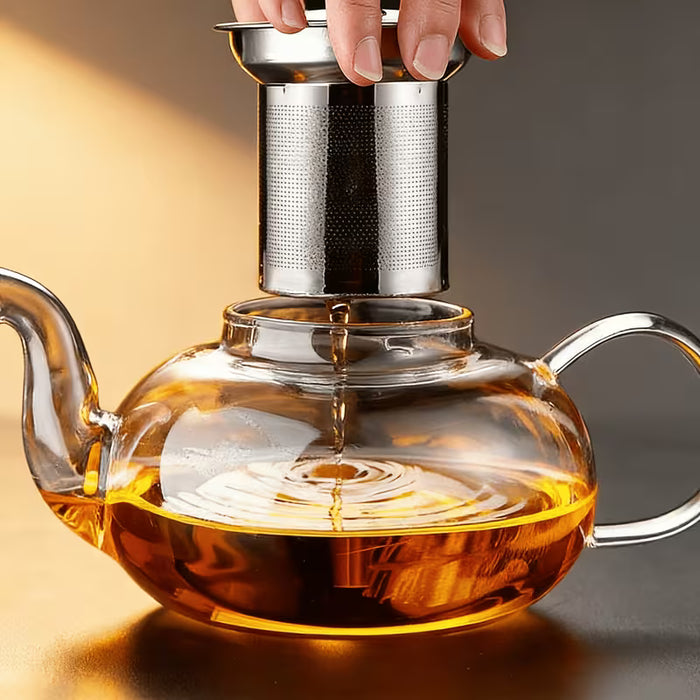 Tetera de vidrio transparente con colador de té y tapa, ideal para preparar té en casa