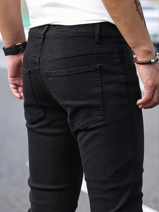 Jeans ajustados elásticos negros para hombre con diseño desgarrado moderno