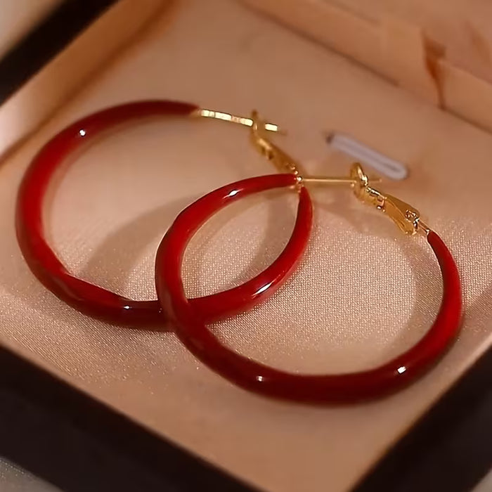 Pendientes de mujer rojo retro y elegante, con hebilla dorada