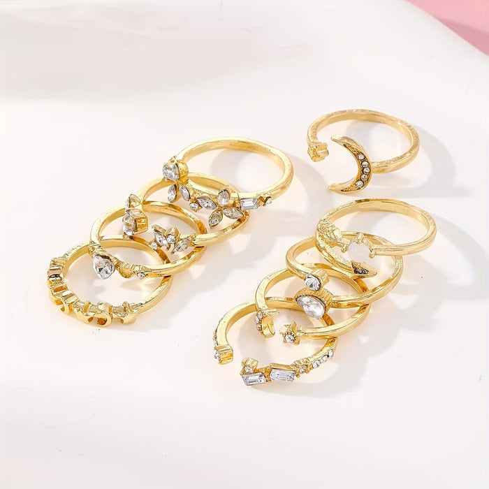 Conjunto de 9 anillos con forma de lágrima adornados con diamantes de imitación con estrellas y lunas