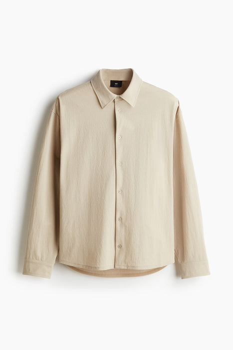 H&M Camisa de corte holgado de color solido