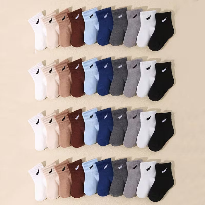 10 pares de calcetines de media caña casuales de color liso para niños