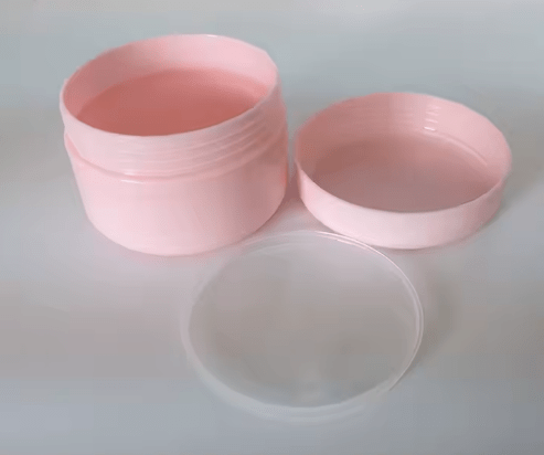 Frasco vacío de plástico rosado con forma redonda para cremas - Quierox - Tienda Online