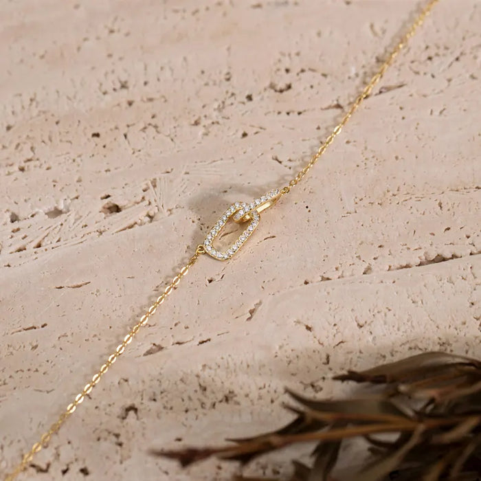 Collar entrelazado de colgante de eslabones ovalados de circonita