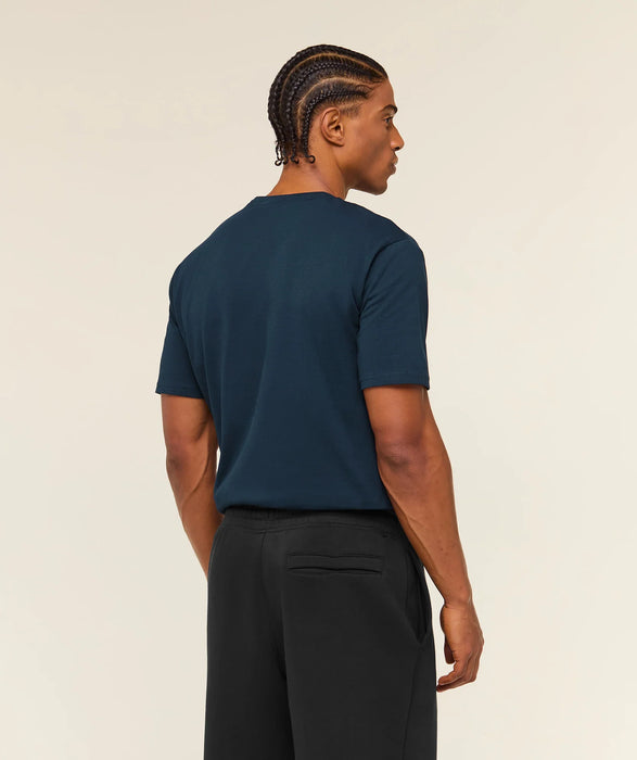 Gymshark Camiseta con escudo de ajuste regular