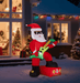 Inflable navideño de 2,28 m x 1,42 m con Papá Noel iluminado tocando la guitarra eléctrica. - Quierox - Tienda Online
