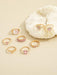 Juego de 8 anillos apilables, Rose con circonita cúbica, color dorado y rosa - Quierox - Tienda Online