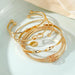 Juego de pulseras doradas apilables abiertas y ajustables de estilo bohemio - Quierox - Tienda Online