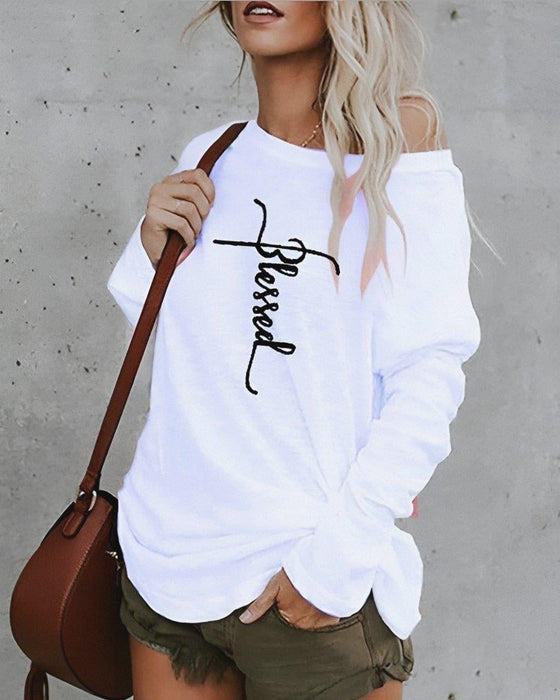 Blusa de mujer de manga larga con escote Bardot y detalle estampado