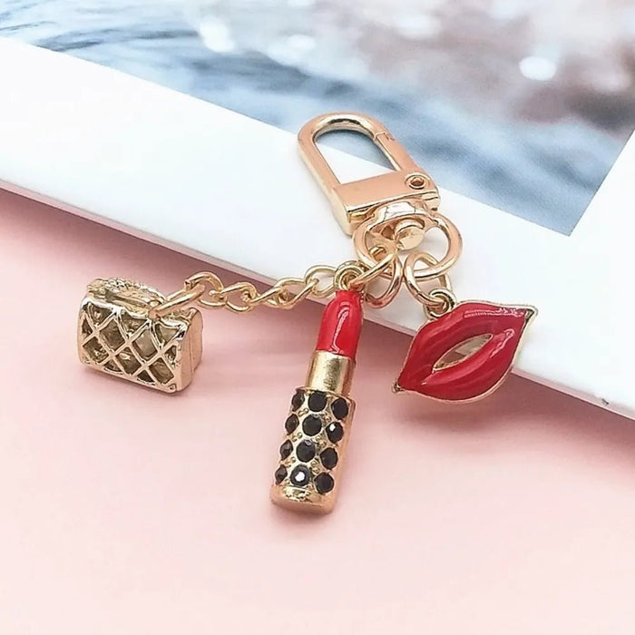 Llavero con colgante de labios, bolso y pintalabios - Quierox - Tienda Online