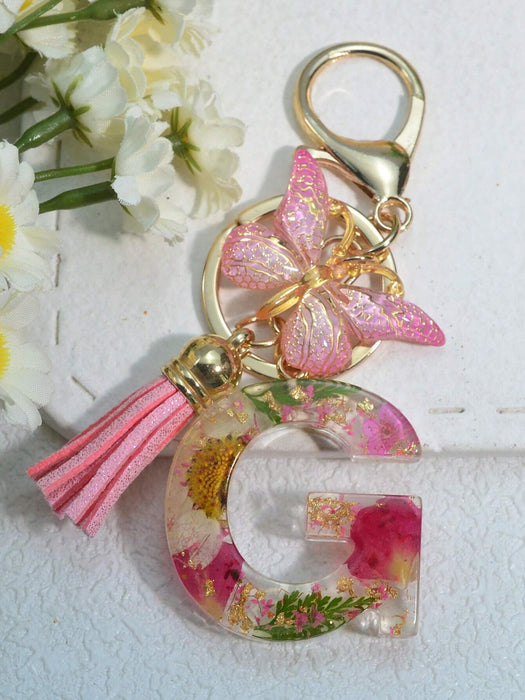 Llavero con inicial para niñas y mujeres, llavero rosa con flor seca de diente de león - Quierox - Tienda Online