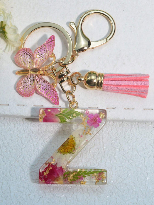 Llavero con inicial para niñas y mujeres, llavero rosa con flor seca de diente de león - Quierox - Tienda Online