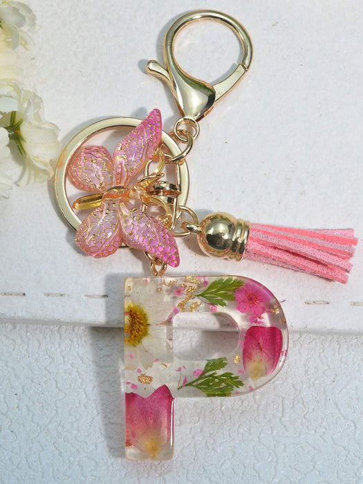 Llavero con inicial para niñas y mujeres, llavero rosa con flor seca de diente de león - Quierox - Tienda Online