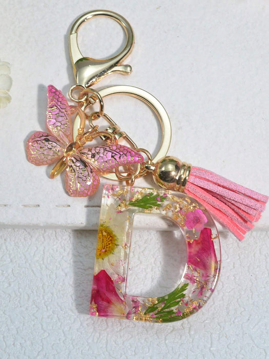 Llavero con inicial para niñas y mujeres, llavero rosa con flor seca de diente de león - Quierox - Tienda Online