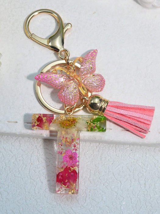 Llavero con inicial para niñas y mujeres, llavero rosa con flor seca de diente de león - Quierox - Tienda Online