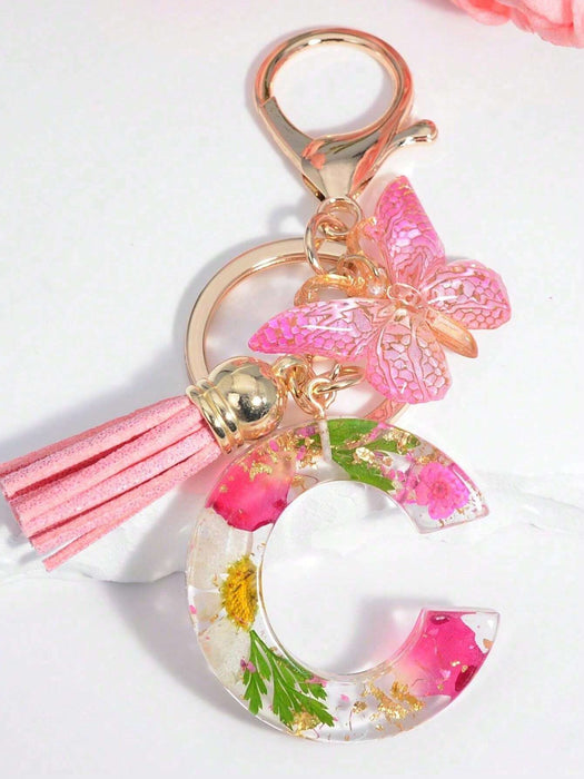 Llavero con inicial para niñas y mujeres, llavero rosa con flor seca de diente de león - Quierox - Tienda Online