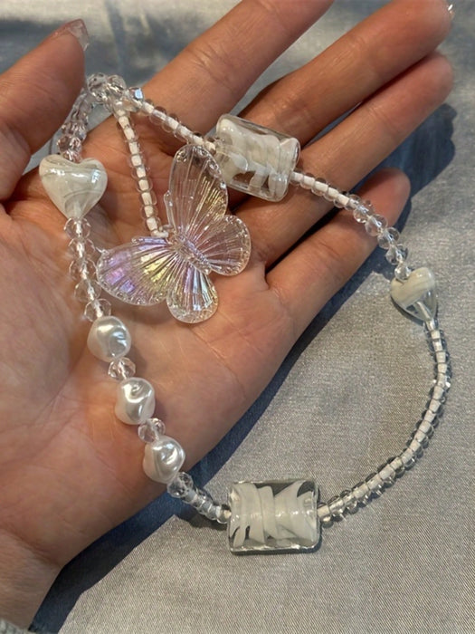 Funda para celular de lindo colgante de mariposa con forma de corazón en espiral