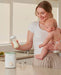 Momcozy Calentador de biberones analógico Nutri Smart - Quierox - Tienda Online