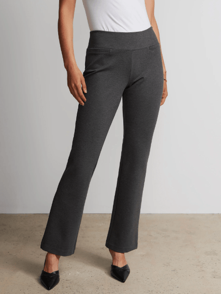 Pantalón de tiro alto con corte acampanado y cuello alto — Quierox