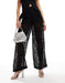 Pantalones transparentes de ASOS DESIGN con estampado animal desgastado en negro - Quierox - Tienda Online