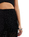 Pantalones transparentes de ASOS DESIGN con estampado animal desgastado en negro - Quierox - Tienda Online