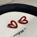 Pendientes Ankela rojos de boton con forma de corazon - Quierox - Tienda Online