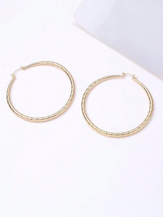 Pendientes de aro grandes con acabado chapado en oro, con patrón de puntos asimétricos - Quierox - Tienda Online