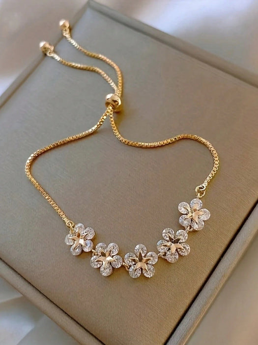 Pulsera ajustable con dije floral - Joyería elegante y minimalista para mujer - Quierox - Tienda Online
