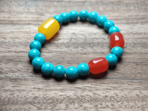 Pulsera con cuentas y elementos coloridos. - Quierox - Tienda Online