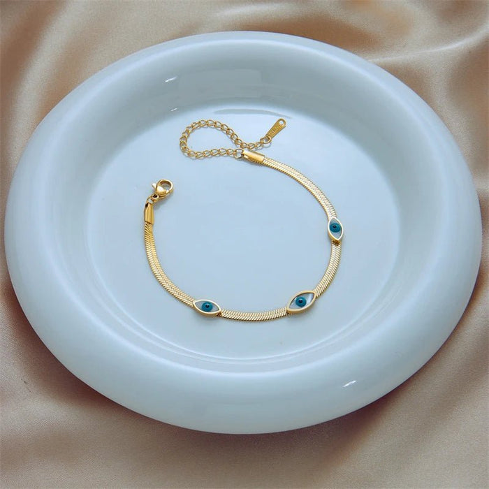 Pulsera de acero inoxidable con dije de ojo azul para mujer, Color dorado - Quierox - Tienda Online