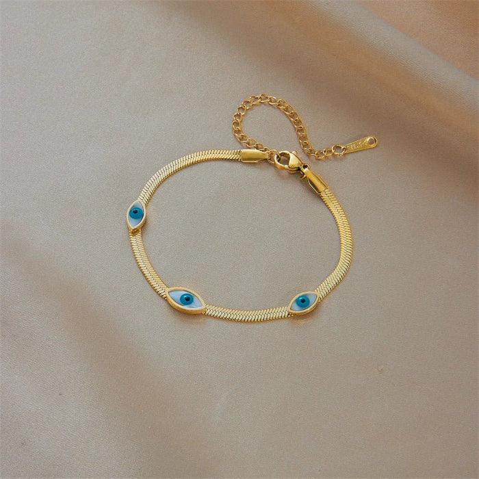 Pulsera de acero inoxidable con dije de ojo azul para mujer, Color dorado - Quierox - Tienda Online