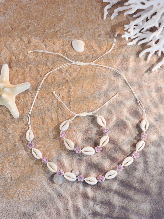 Set de 2 piezas de pulsera y collar con flores de arcilla polimérica y conchas - Quierox - Tienda Online