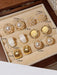Set de 6pcs de aretes de perla con diseño de ojo de gato con superficie lisa - Quierox - Tienda Online