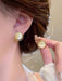 Set de 6pcs de aretes de perla con diseño de ojo de gato con superficie lisa - Quierox - Tienda Online