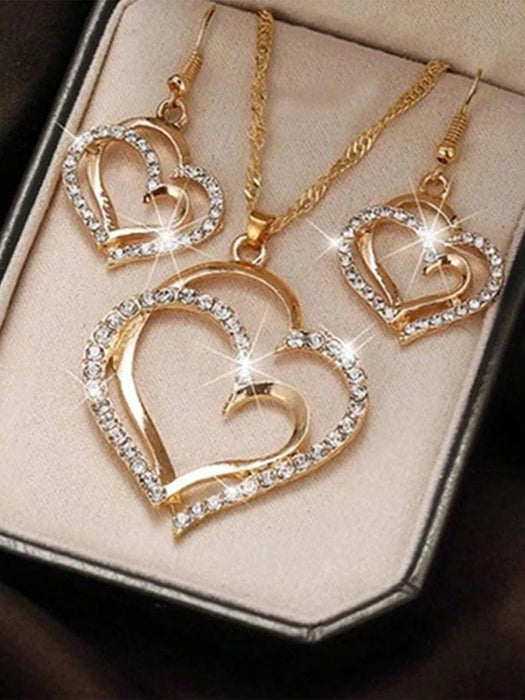 Set de joyería de 2 piezas con colgante y pendientes con forma de corazón hueco - Quierox - Tienda Online