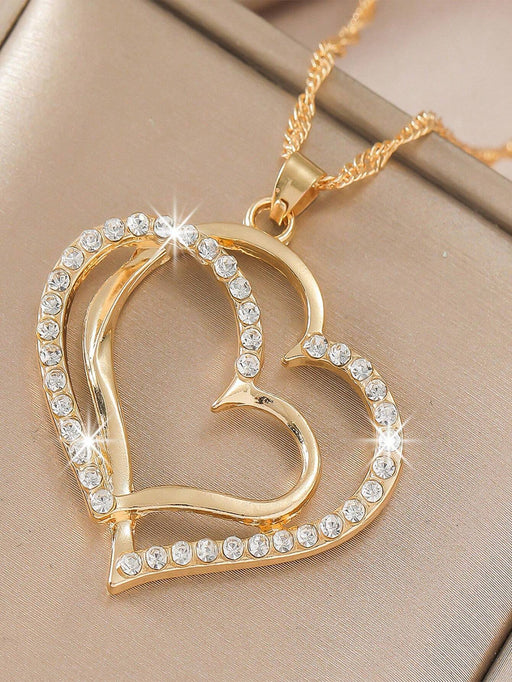 Set de joyería de 2 piezas con colgante y pendientes con forma de corazón hueco - Quierox - Tienda Online