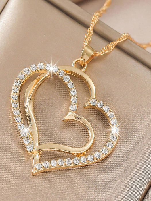 Set de joyería de 2 piezas con colgante y pendientes con forma de corazón hueco - Quierox - Tienda Online