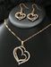 Set de joyería de 2 piezas con colgante y pendientes con forma de corazón hueco - Quierox - Tienda Online